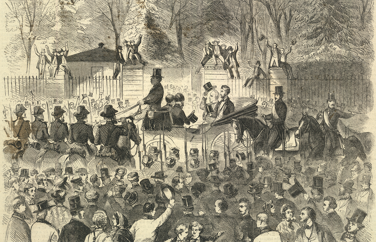 Abraham Lincoln rides in a carriage at his Inaugural parade in 1861.