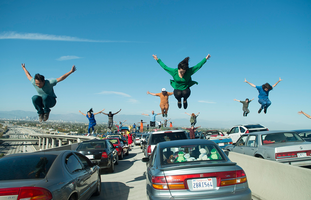 The opening scene features a traffic jam on the LA freeway. The drivers get out and perform a big song-and-dance number using specially reinforced cars. Now wouldn't that liven up your morning commute?