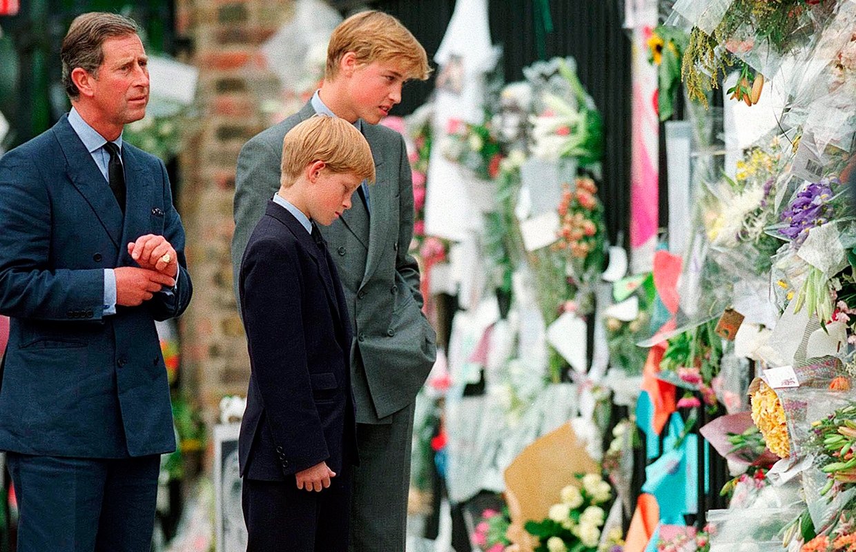 Princes Charles, William and Harry inspecting some of the thousands of floral tributes to Diana left by the public outside Kensington Palace after her death in 1997.