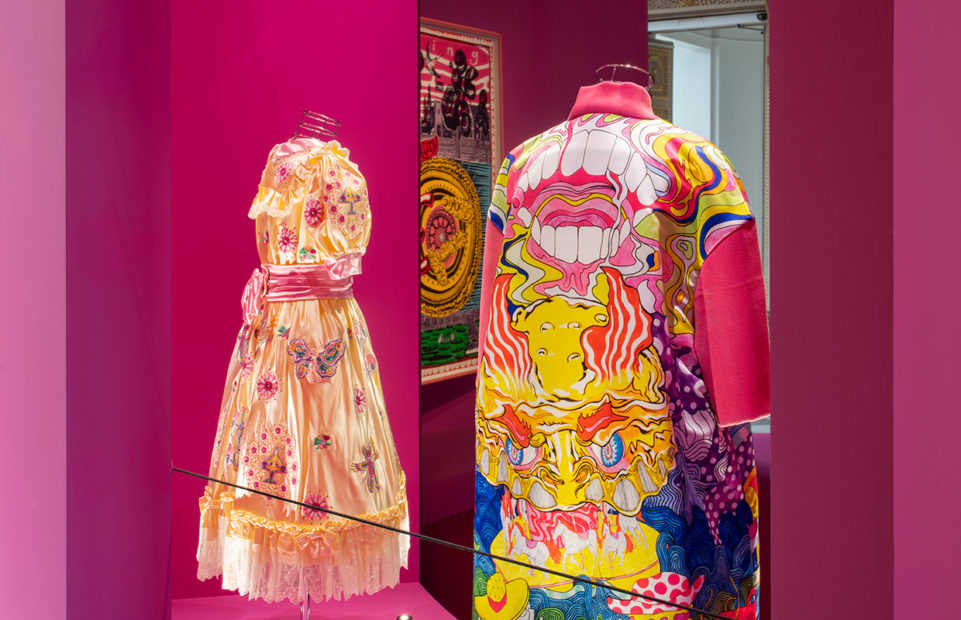 When Grayson appears as Claire, he is a work of art, with brightly coloured tailor-made clothes and doll-like make up. Perry’s dresses, conceived by him but made by a dressmaker, are included in the exhibition.