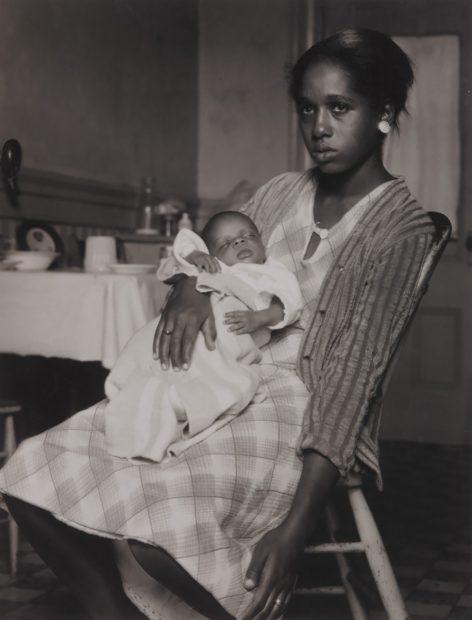 Young black woman with infant, 1934. 