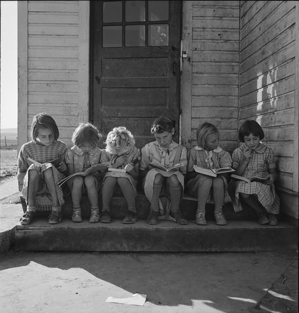 Girls of Lincoln Bench School study their reading lesson. Near Ontario, Oregon