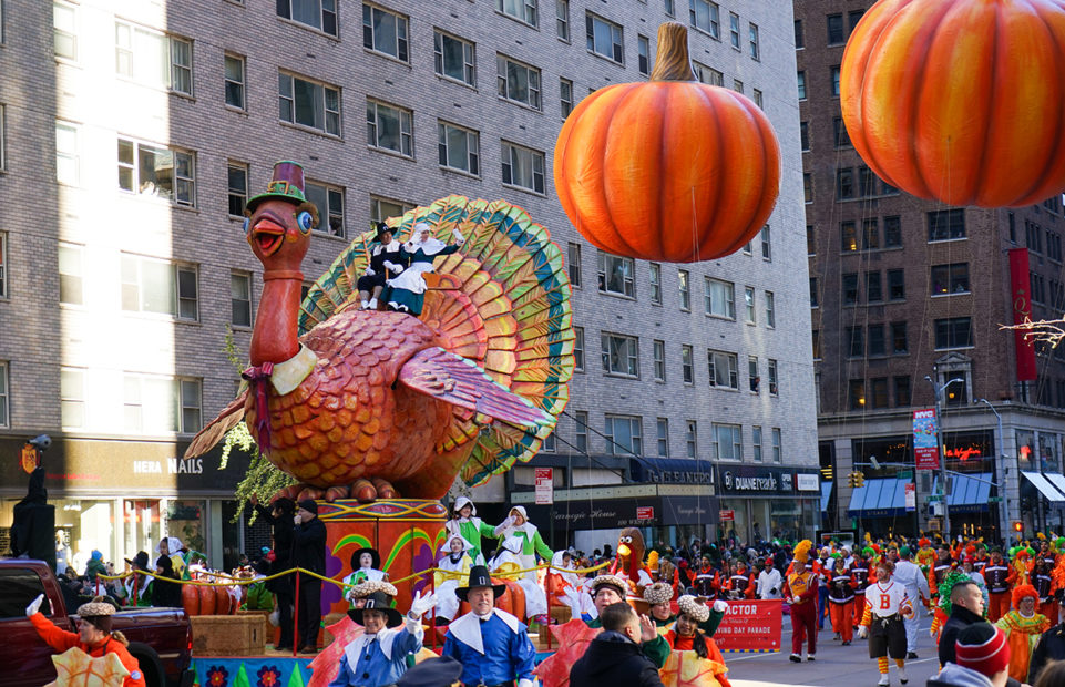 Giant balloons of turkey and pumpkin in the NYC Marcy's Thanksgiving parade.