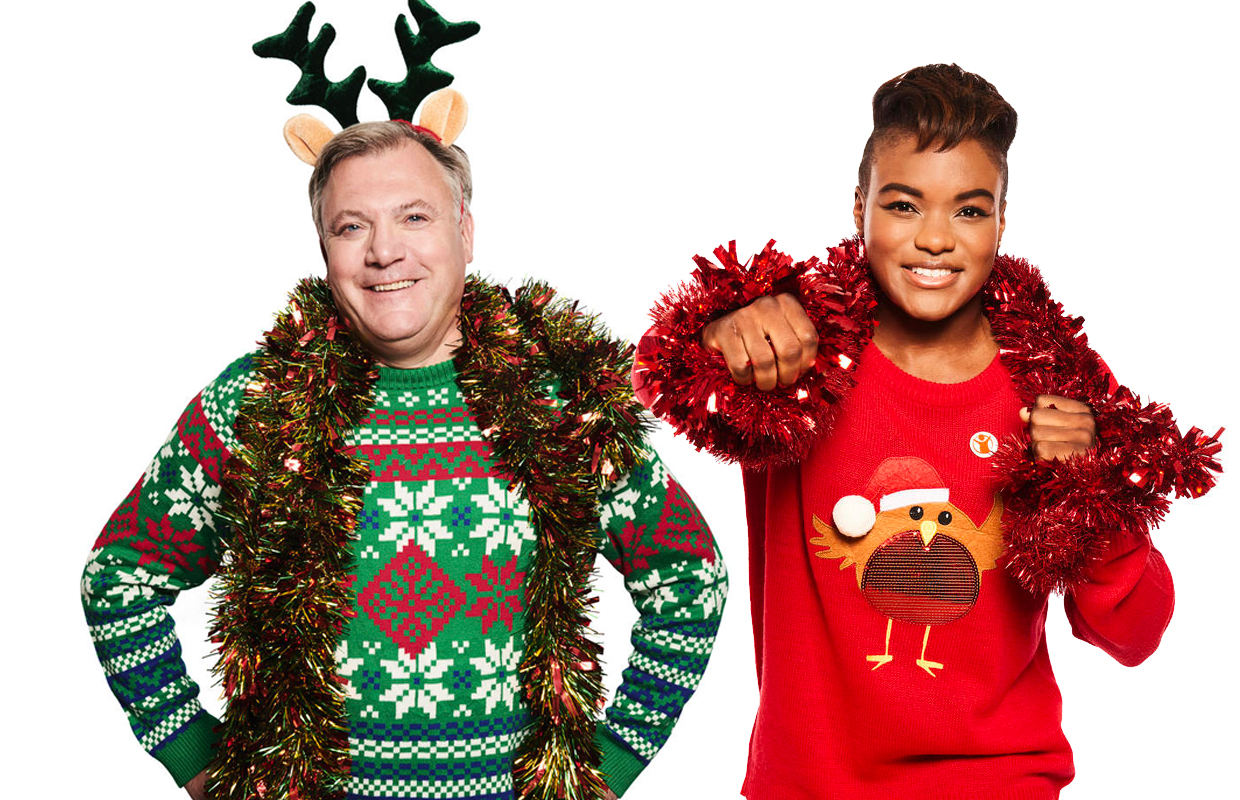 Former Labour Children's Minister Ed Balls and Olympic champion boxer Nicola Adams in Christmas themed jumpers.