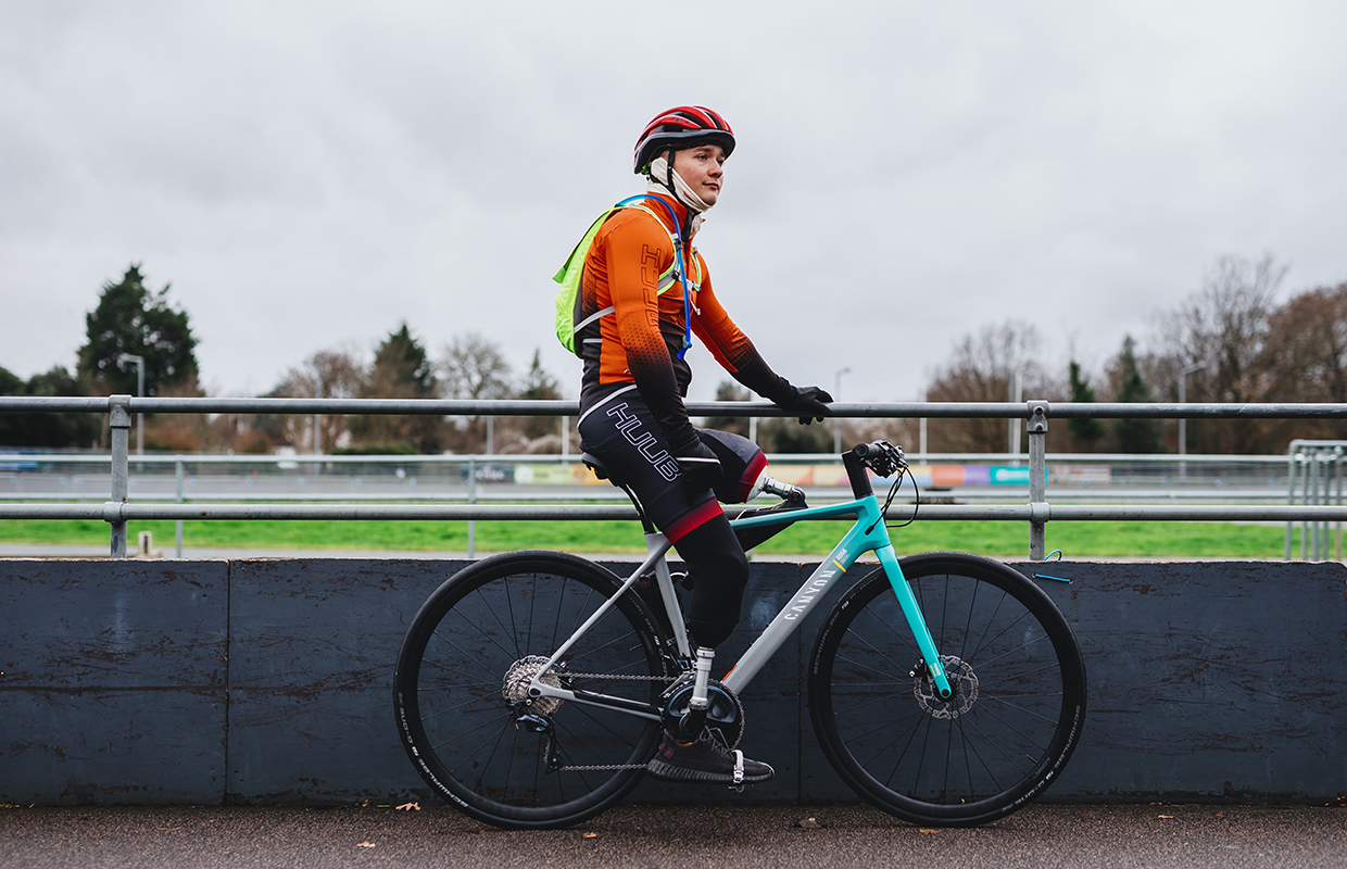 Billy Monger on a bike with his prostheses.