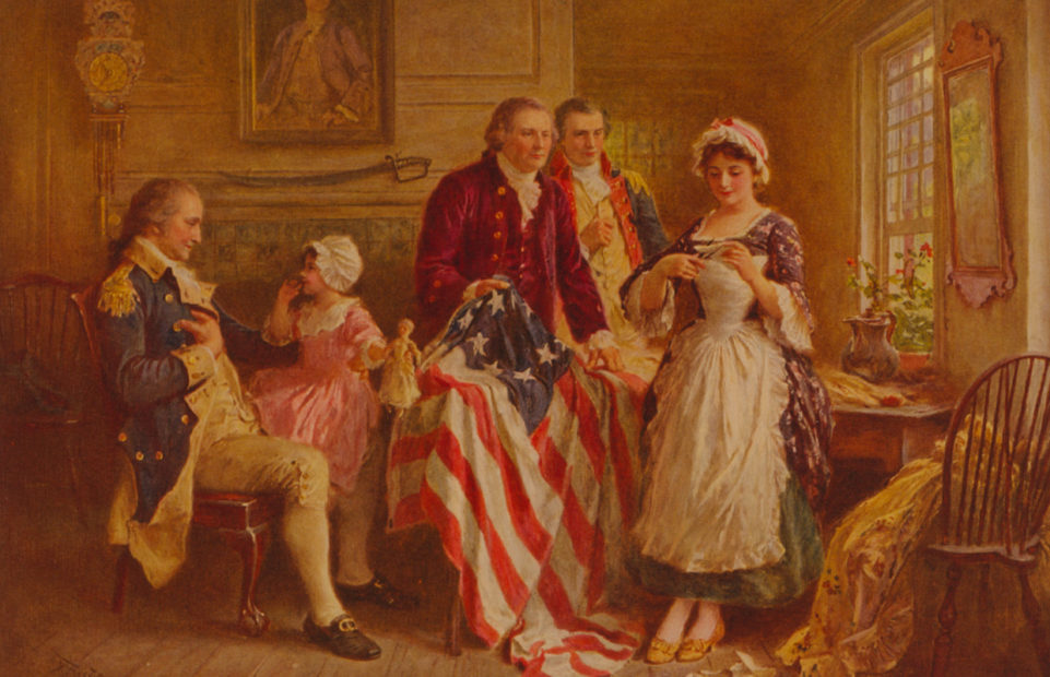 The birth of the flag as imagined by painter JLG Ferris: Betsy Ross is sewing on the right. George Washington is seated to the left.