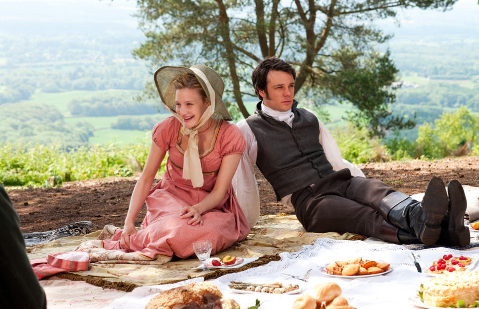 Emma (Romola Garai) and Frank Churchill (Rupert Evans) at a picnic.