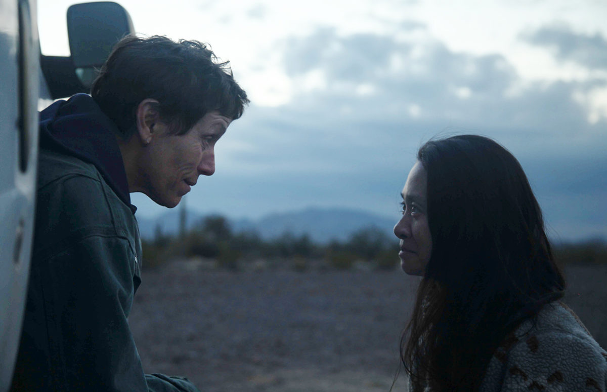 Frances McDormand looks out of her camper van at director Chloé Zhao.