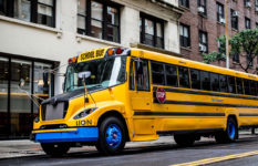 An electric yellow school bus.