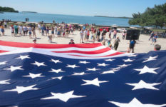 A giant Stars and Stripes as part of a Flag Day celebration at the National Park Service’s Perry's Victory and International Peace Memorial in Ohio.