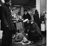 December 21, 1961. Chicago, ILvm1961w00847-03-mc An injured person on the ground surrounded by police and a crowd