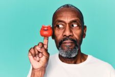 SIr Lenny Henry, one of the founders of Comic Relief, displaying one of this year's plastic-free noses.