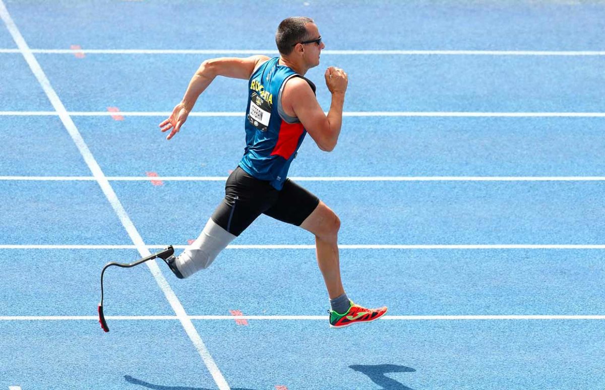 A parathlete running using a running blade