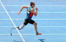 A parathlete running using a running blade