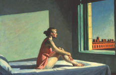 Edward Hopper, Morning Sun, 1952. A woman in a short shift on a plain bed looking out of a window where we see buildings