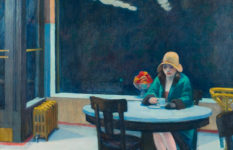 Edward Hopper's Automat shows a woman in 1920s clothes sitting in a café at night staring at a cup of coffee. Edward Hopper, Automat, 1927.