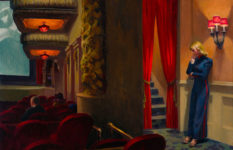A painting of a woman, possibly an usherette, standing off to the side in a cinema screening room/
