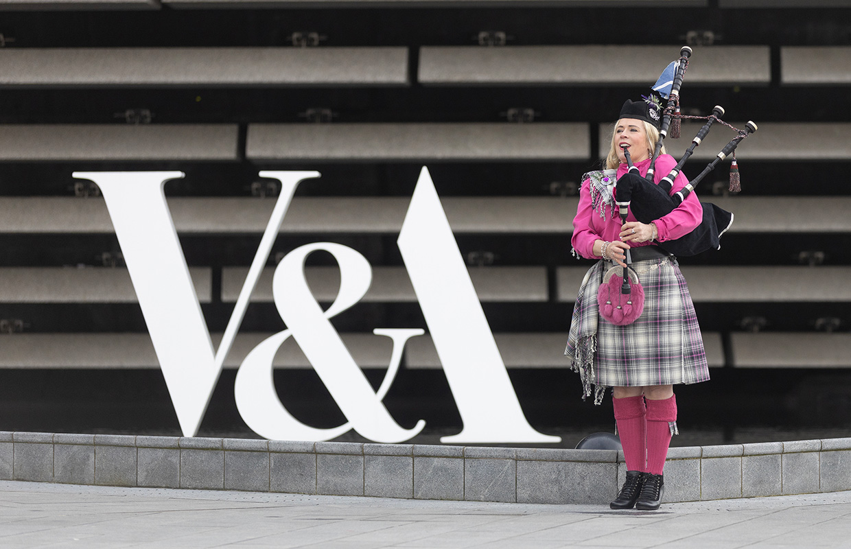 Bagpiper Louise Marshal outside the V&A Dundee museum.