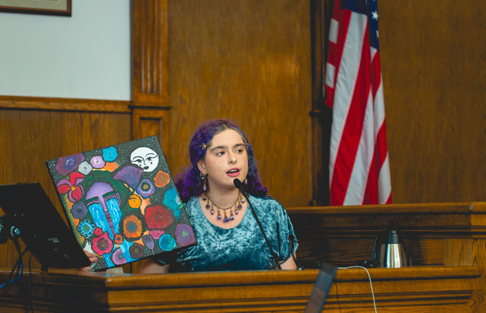 Youth plaintiff Olivia V, 20, who suffers from asthma, giving evidence in court.