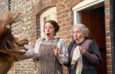 Olivia Colman and Gemma Jones looking shocked in Wicked Little Letters.