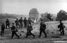 German soldiers leaving Aleth fort under the watchful gaze of American soldiers. Photographed by Miller on 17 August, 1944.