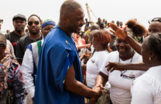 Idris Elba meeting the locals on Sherbro Island.