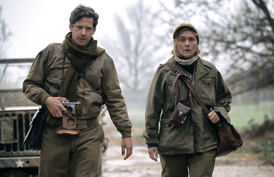 Andy Samberg as Davie Scherman and Kate Winslet as Lee Miller in "Lee".