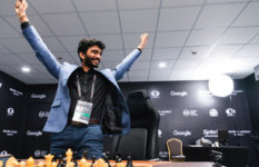Gukesh Dommaraju celebrating his win.