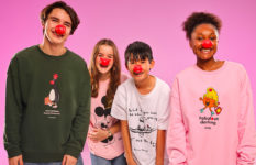 Four teenagers wearing Comic Relief Red Noses and REd Nose Day T-shirts.