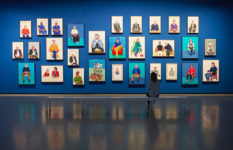 A display of portraits in Hockney's exhibition.