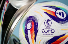 A football and the trophy for the Women's Euros 2025.