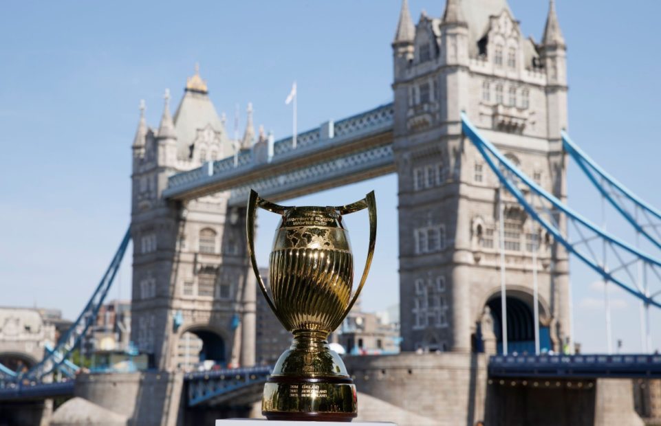The rugby world cup trophy photographed in front of Tower Bridge in London.