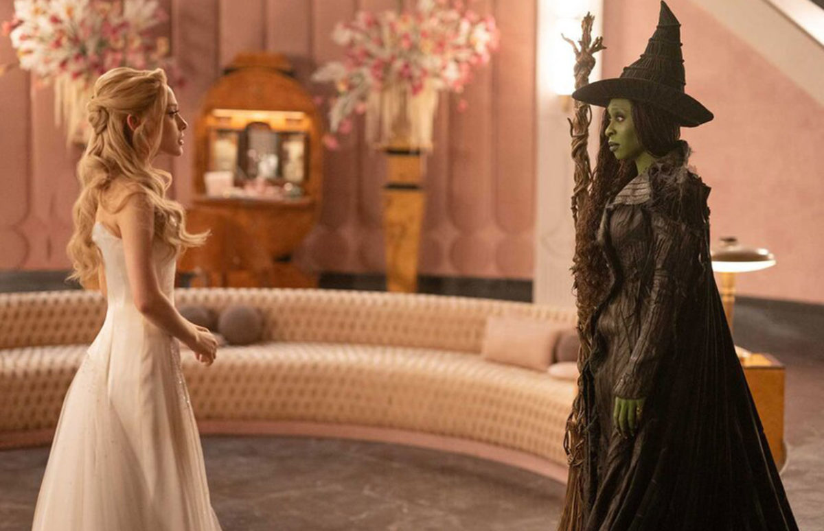 Glinda and Elphaba in a bedroom.